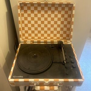 Cream and yellow checkered suitcase record player with bluetooth connection